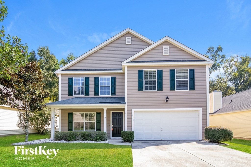 A two-story house with a garage is for sale by FirstKey Homes.
