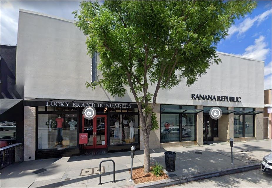 a building with a tree in front of it
