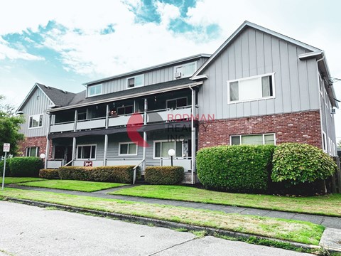 A building with a red sign that says "BROWN".