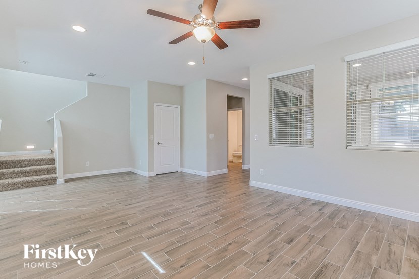 the living room is open to theoyer and family room