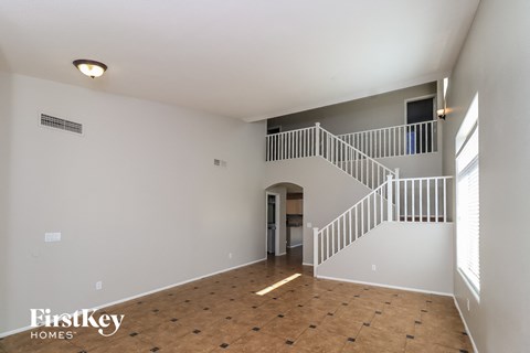 a view of the living room from the top of the stairs