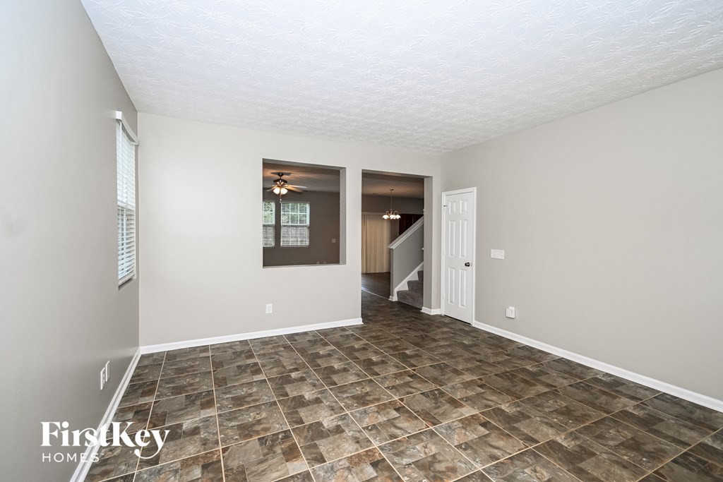 the living room is clean and ready for us to move in