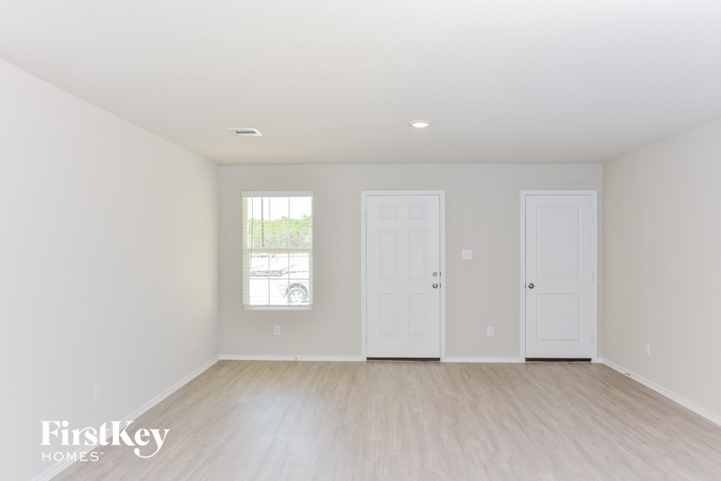the living room is clean and ready for us to move in