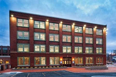 a large brick building with lights