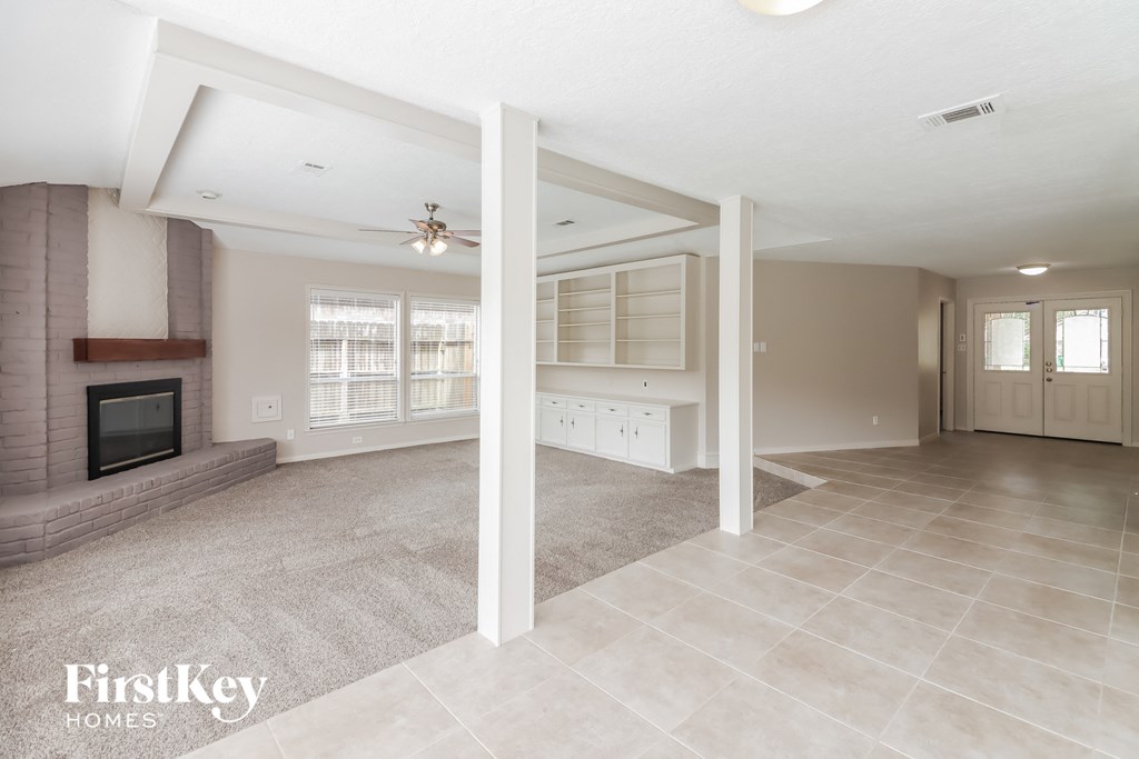 the living room and family room with the fireplace