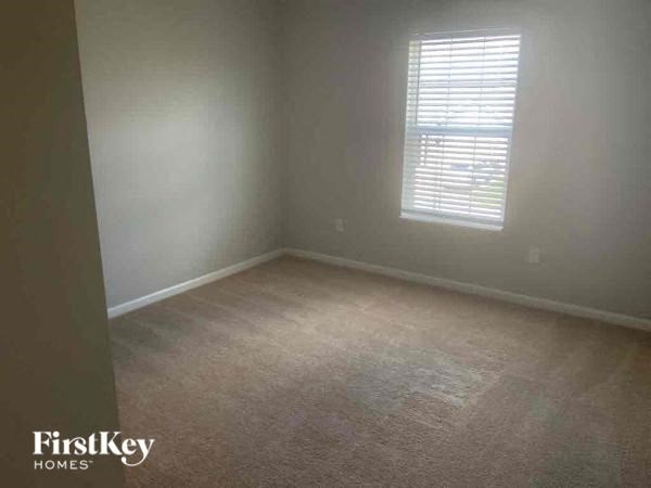 an empty room with a window in it