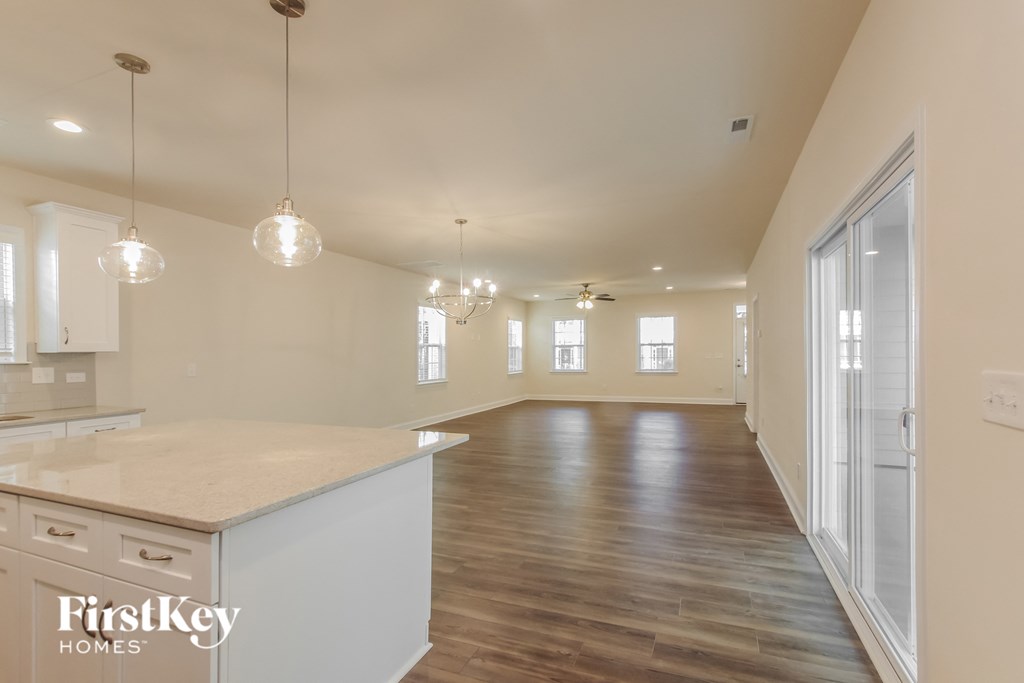 the kitchen and living room of an open floor plan
