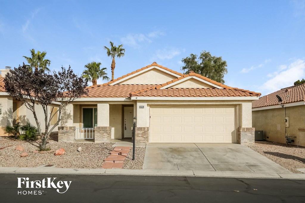 front view of a house with a garage door