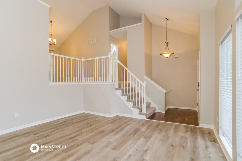 the family room with stairs to the second floor