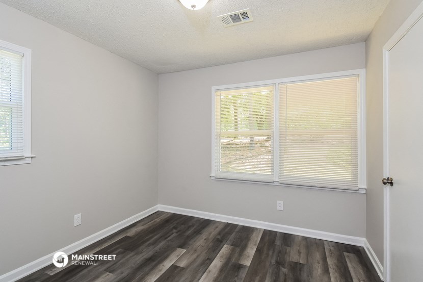 the spacious living room of our studio apartment at university estates in saint louis
