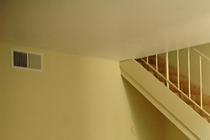 loftstyleinspiredstairs the bottom of a staircase in a home with a carpeted floor