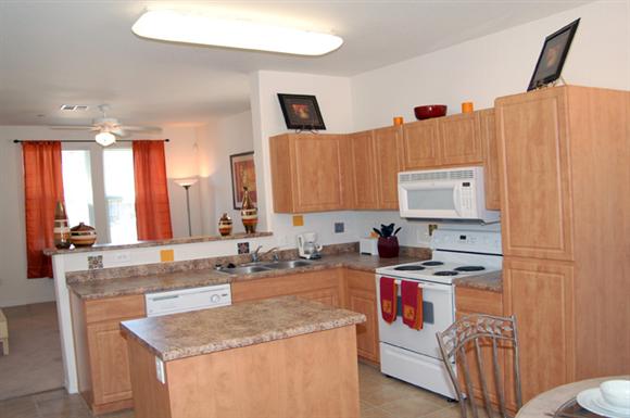 Apartment kitchen area and island-Matthew Henson IV Apartments, Phoenix, AZ