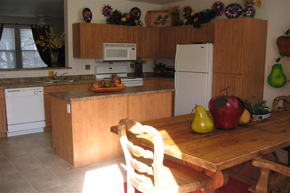 Dining room and kitchen area-Matthew Henson IV Apartments, Phoenix, AZ