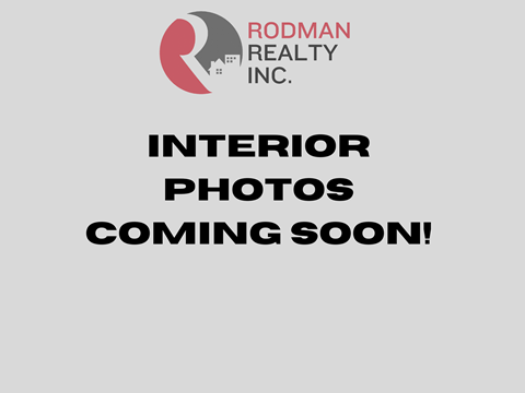 Rodman Realty Inc. logo with text "Interior Photos Coming Soon!".
