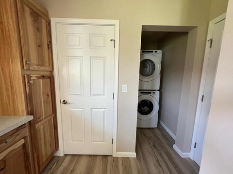 a laundry room with a washer and dryer in it