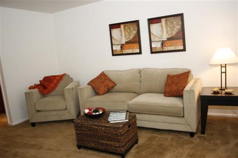 a living room with a couch and a table