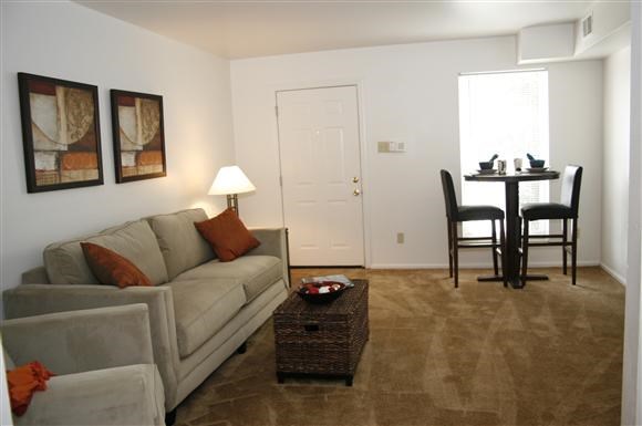 a living room with a couch and a table