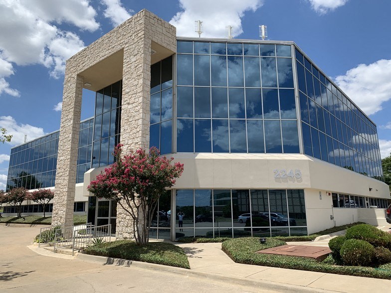 a large office building with glass windows