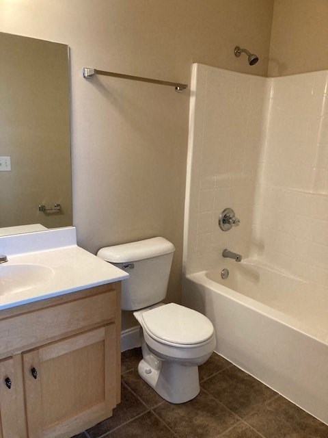 a bathroom with a toilet and a tub and a sink
