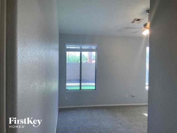 A room with a window and a FirstKey Homes logo.