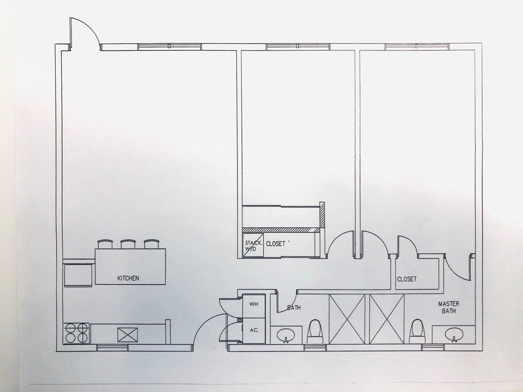 a floor plan of a small room with a bathroom and a window