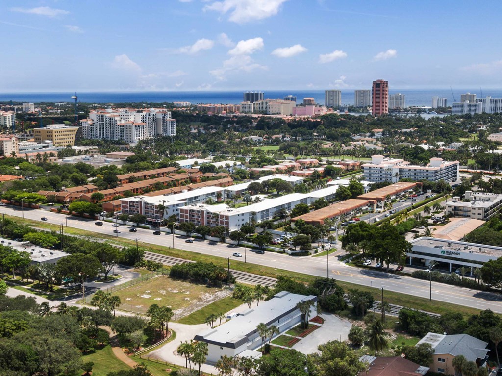 an aerial view of the city and the ocean