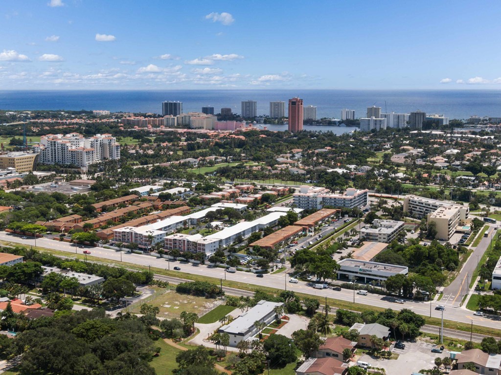 an aerial view of the city and the ocean