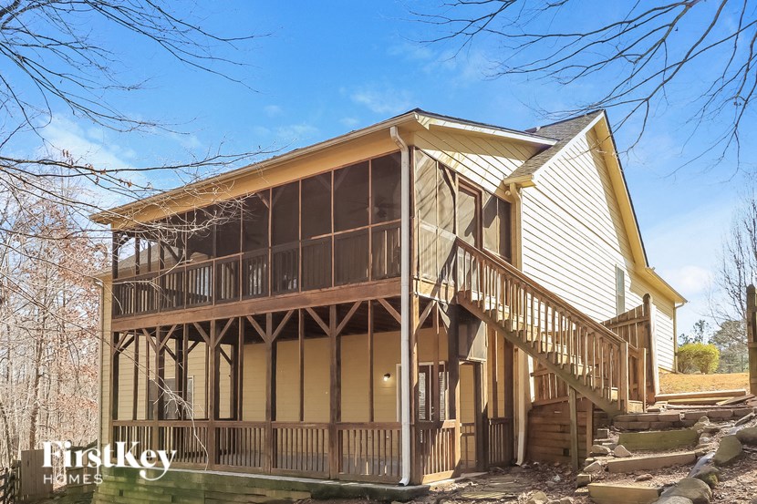 the view of a new screened porch on a house