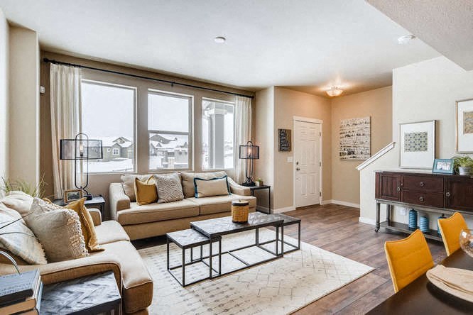 a living room with a couch and a table