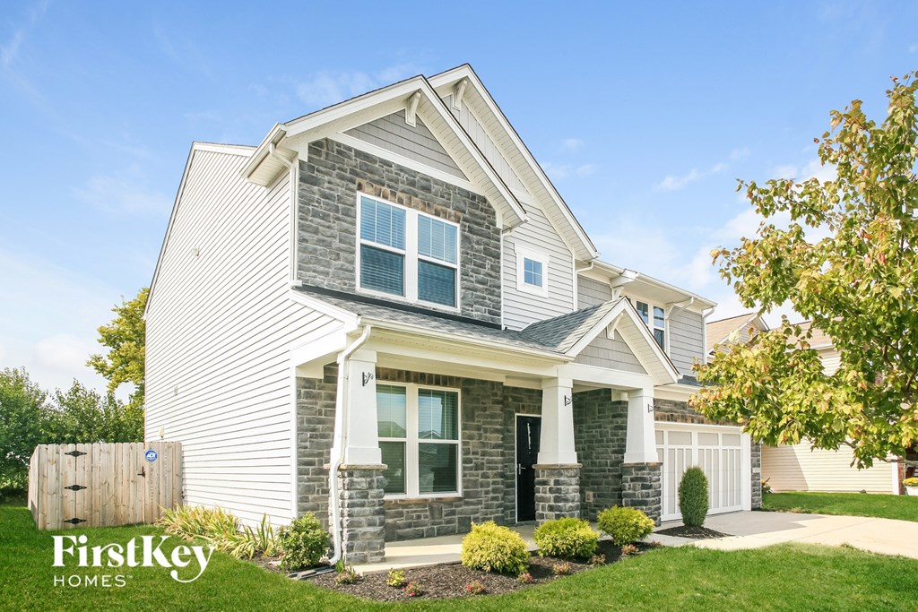 a white house and white siding