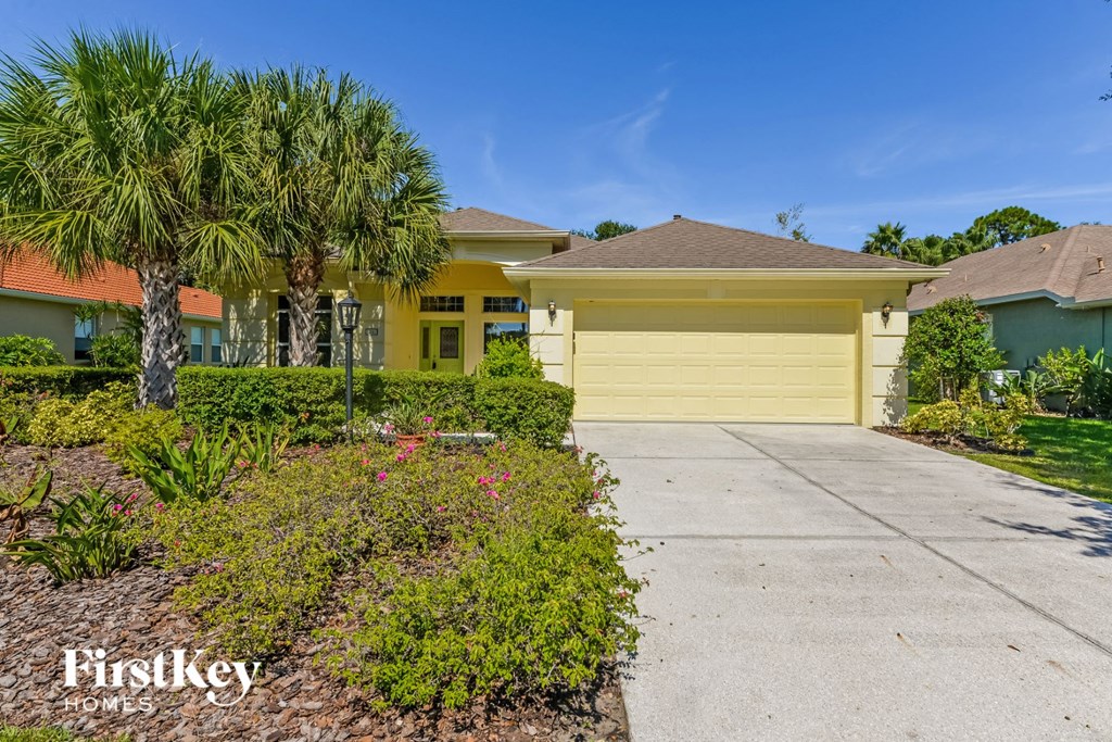 A house with a garage is for sale by FirstKey Homes.