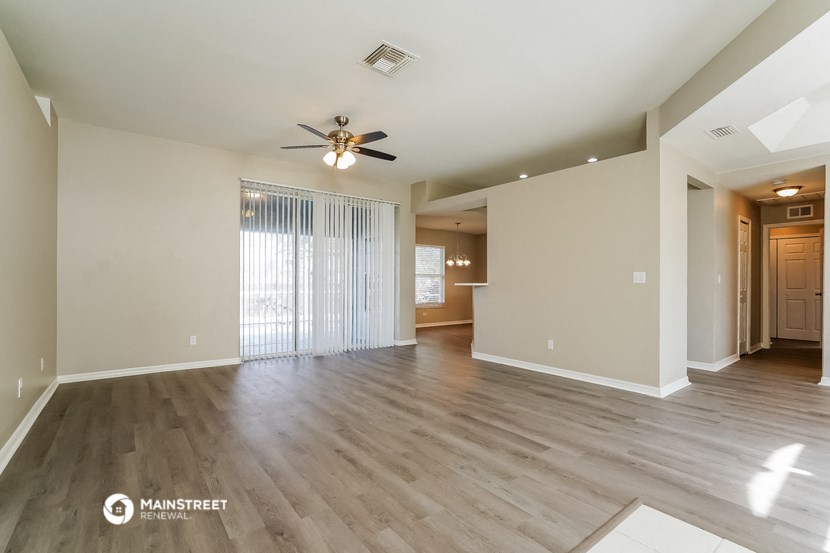 the living room and dining room are spacious and ready for you to enjoy