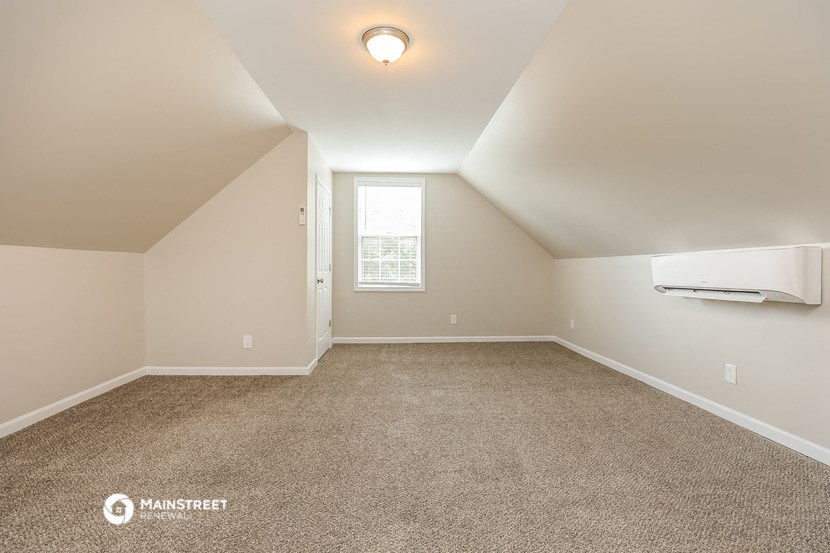 the upstairs bonus room is spacious and ready to use as an office