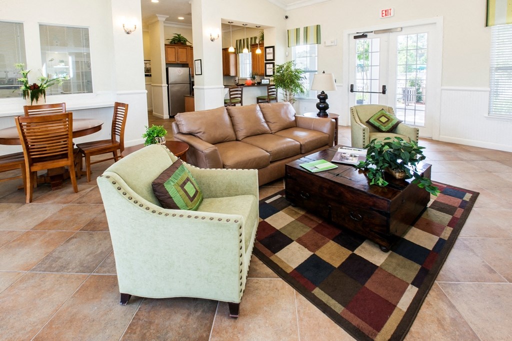 a living room with a couch and a table