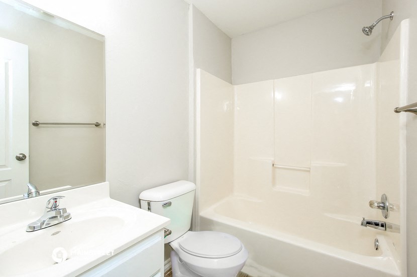 a bathroom with a sink toilet and a shower