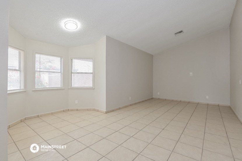 the spacious living room is clean and ready for you to use