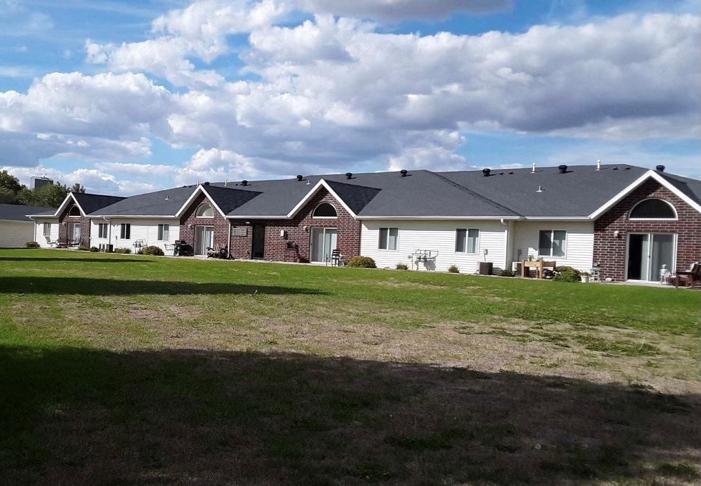 a house with a yard in front of it