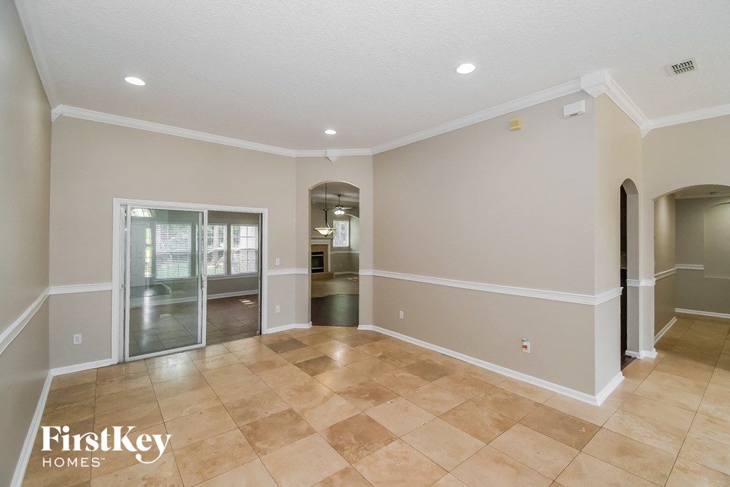 the living room and dining room are spacious and open to the hallway