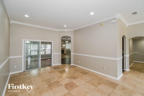 the living room and dining room are spacious and open to the hallway