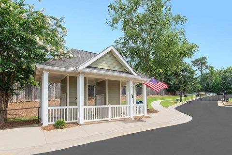 A house with a flag on the porch.
