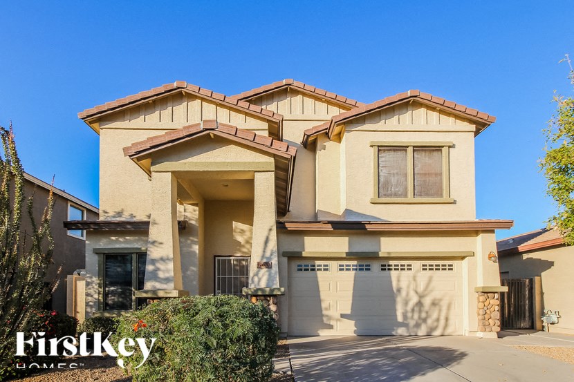 A house with a clear blue sky in the background.