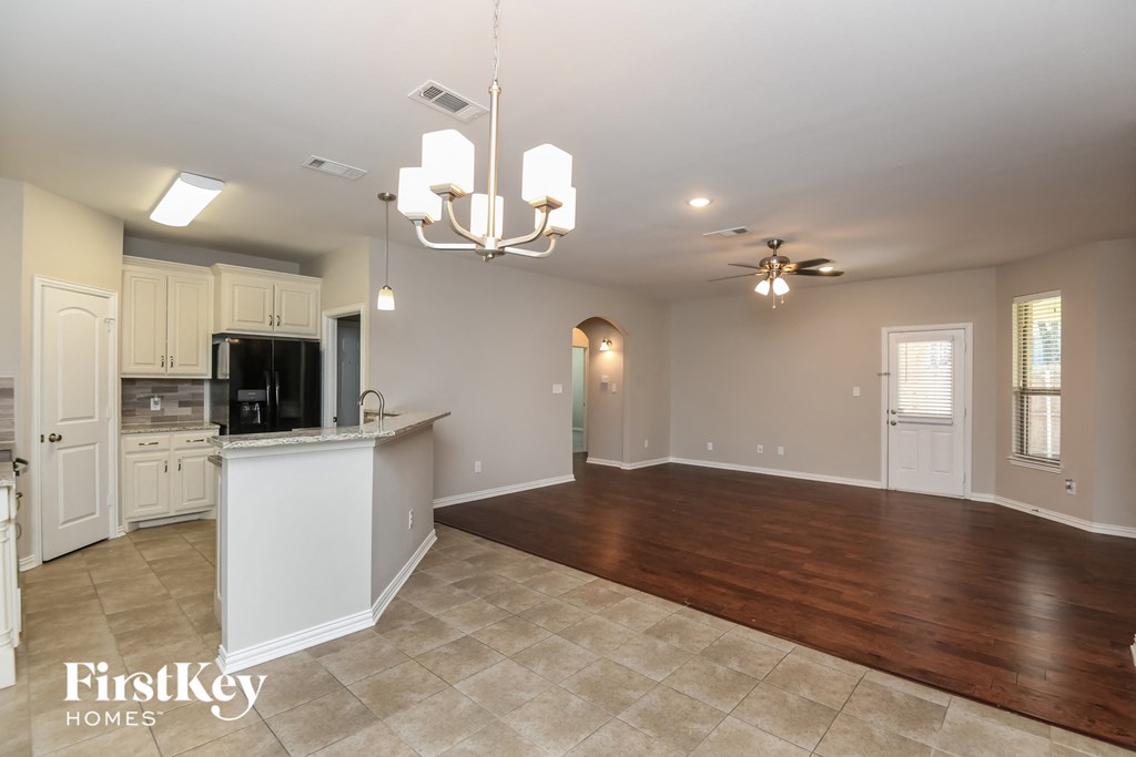 the kitchen and living room are spacious and open to the living room