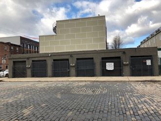 a building with a row of garage doors