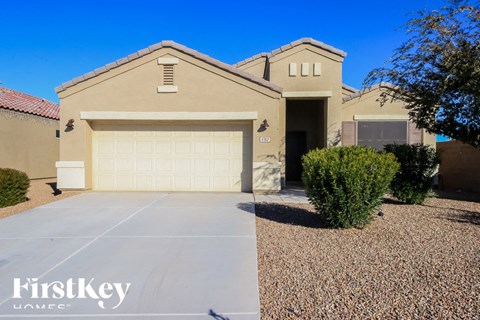 A house with a garage door that says "100" on it.