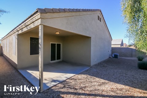 A house with a FirstKey Homes sign in front of it.