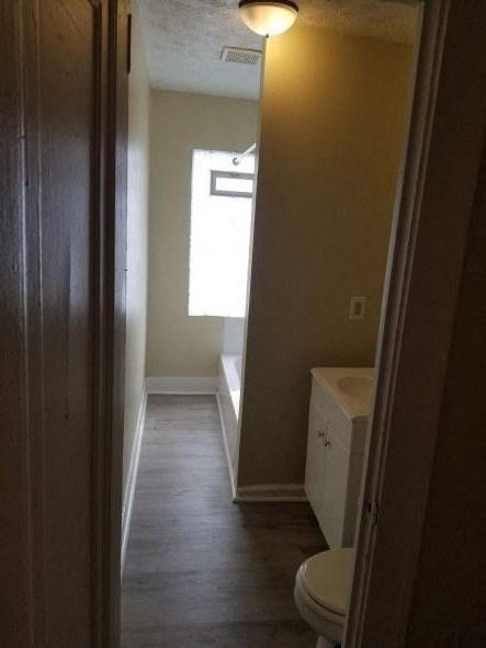 a small bathroom with a sink and a toilet