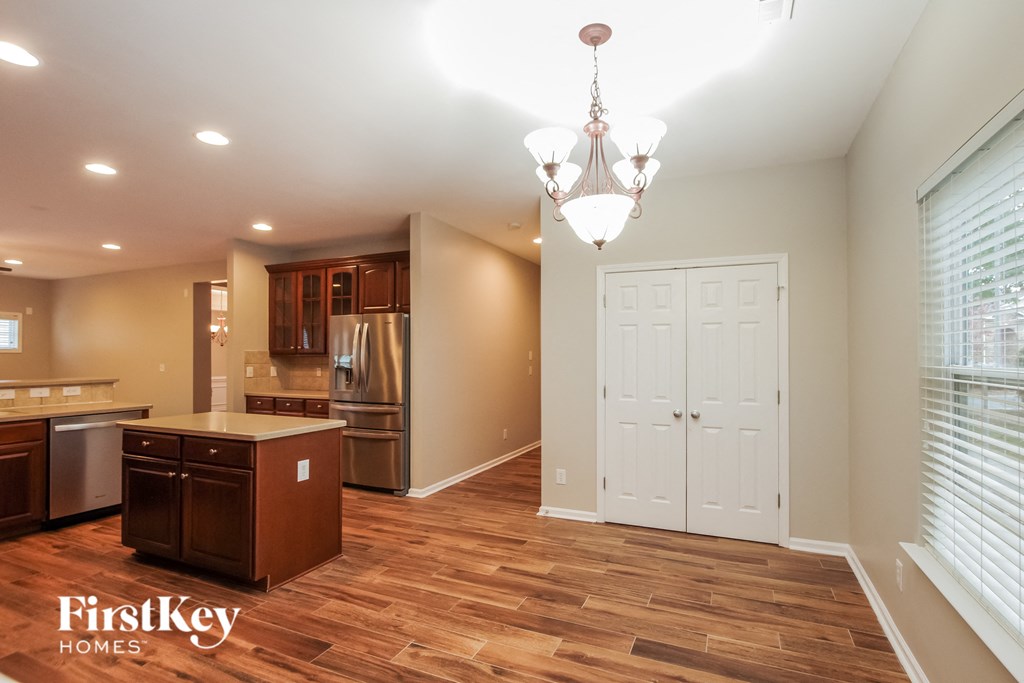 the kitchen and dining room are open to the living room