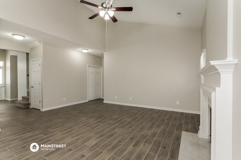 the living room and entry into the kitchen