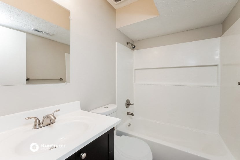 the preserve at ballantyne commons apartment bathroom with sink toilet and shower