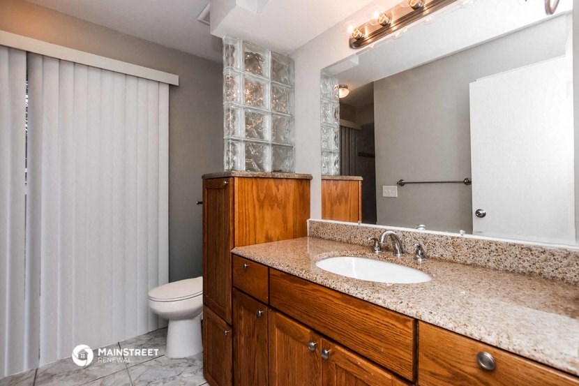 a bathroom with a sink and a toilet